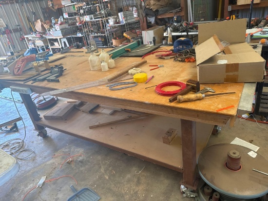 Wood table on castors. Items on table not included