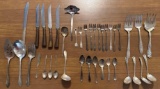 Assortment of Cutlery and Serving Utensils