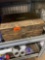 Wooden box with caution tape and blue tape
