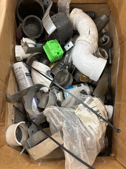 Box contains PVC fittings, gas pipe fittings, silicone, and multiple other items