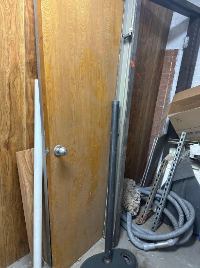 This lot contains Door, brackets, black pipe, toilet, tarp and other items