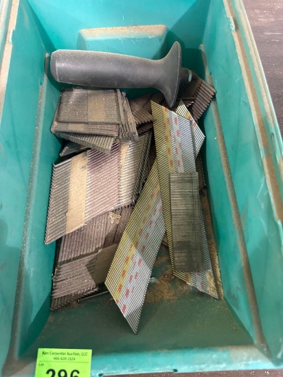 Adhesive cloth roll and nail gun nails