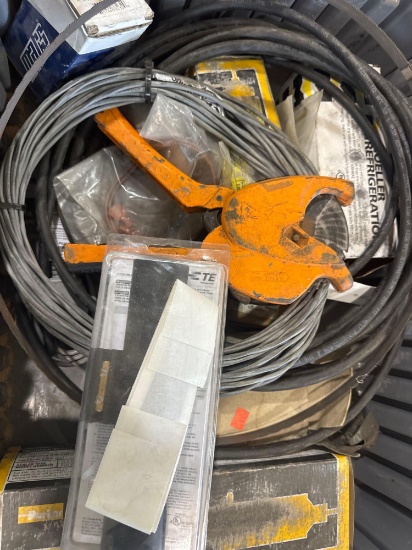 tote contains pipe cutter, Heat shrink UF splice kit, various wire and other items
