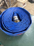 Lay flat blue water hose with fire hydrant style fitting