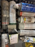Tote with spray paint, glass cleaner and stain