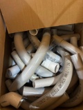 Box with various PVC pieces and fittings