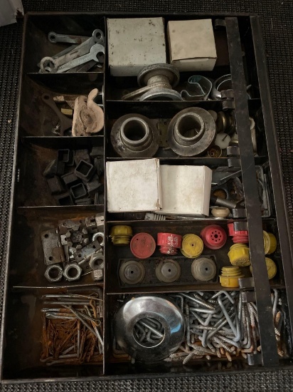 Tray with screws, nuts, and other shop items