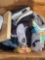Box of various items shoes puzzles and clothes