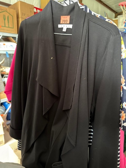 Seven blouses and pair of pants see photo for sizes and make