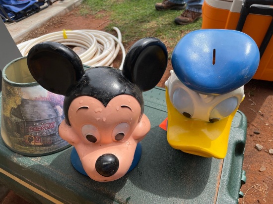 Coca Cola lamp shade and hat, Mickey piggy bank, Donald Duck piggy bank, Goofy piggy bank