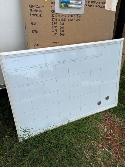 Monthly dry erase board with dry erase markers