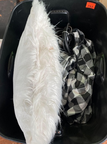 Tote with plaid duvet cover, pillow case, white furry pillow, and shop light