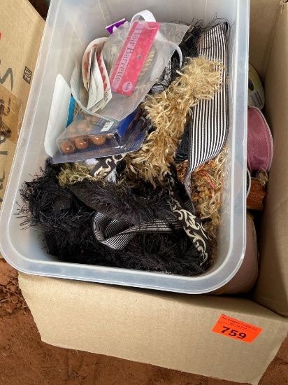 Box with crafting materials, ribbon, buttons, beads, and more