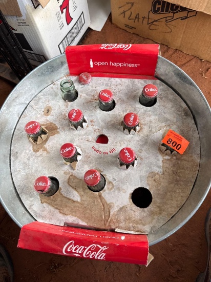 Coca-Cola 8 ounce glass bottles in a galvanized bucket