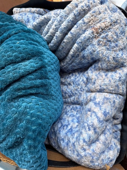 blankets in laundry basket