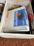 White wood crate with routers, Roku, and misc chargers