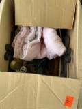 Box with decorative shelves, baby blanket, and other decor items