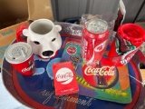 Coca-Cola tray, coin, bank fan, polar bear, mug cards, clipper, and sign mouse pad