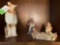 three women figurines, and one dog figuring