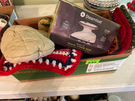 Pot holders, oven mitts, and travel steam iron