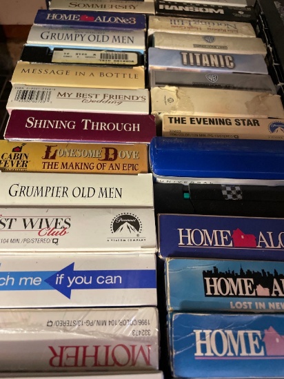 Box of VHS tapes, see photos for titles