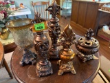 Cande Holder, footed covered footed jar, 3 Flyer-de-lid finials