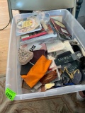 Storage tote with sewing items, needles and buttons, books (see photos for titles and authors) and