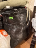 Seat cushion and a mattress protector in bag, size unknown