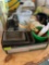 Box with a sifter, cookie cutters, flower vase, salt and pepper shakers, decorating tips and other