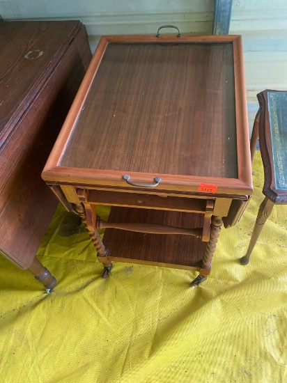 Antique mahogany drop leaf tea cart with tray One wheel the tire is coming off