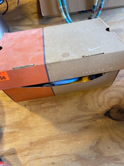Shoebox with quick glue, fuel feed cap fittings, tubing, glue sticks, and various other items