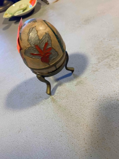 Decorative hand painted brass egg on stand Measurement in photo