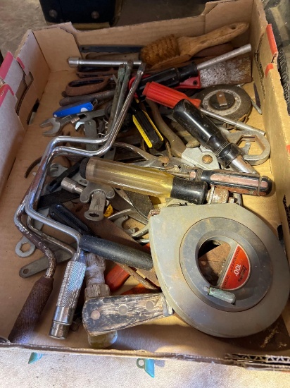 Box with screwdrivers,100 foot tape measure, wire brushes, scrapers and other various items