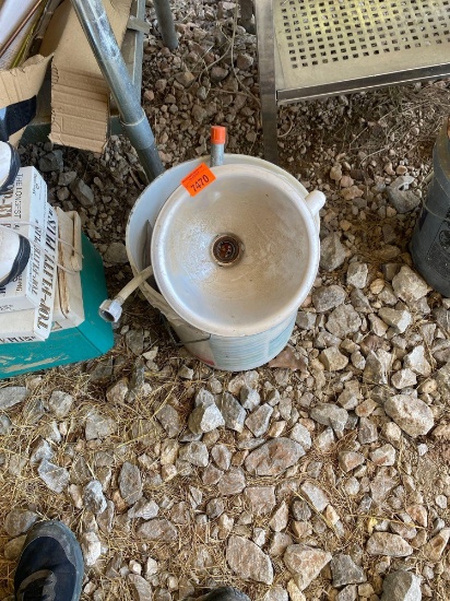 5 Gallon bucket with various PVC items, single bulb light