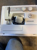 Dressmaker, sewing machine inbox
