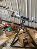 Clay pigeon skeet thrower with box of skeets