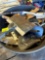 Scraper, scrub brush, fittings in a plastic spill container