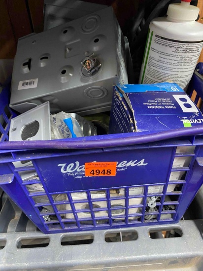 Blue basket with wall plates, frog tape, trailer hook up and much more