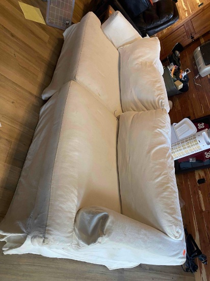 White sofa with hide a bed