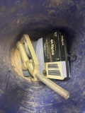 5 gallon bucket with hose clamps, curtain, pump handle, wire brush, gas T and other items