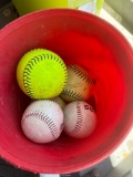 Bucket with softballs