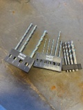 Drill bits with holder