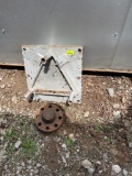 Some type metal base and a lug nut cover