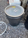 Pea gravel in a container with lid