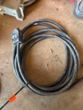 Approximately 15 ft of 10/3 wire with 50 amp male connector