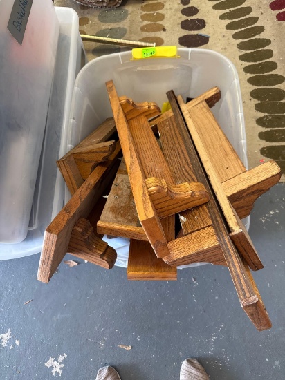 Tote full of wood shelves