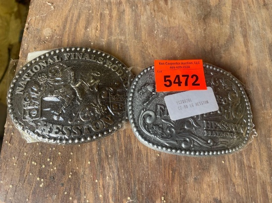 2 Hesston National Finals Rodeo belt buckles