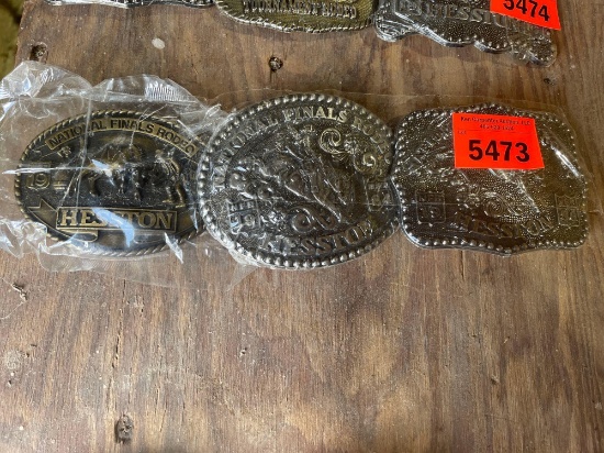 3 Hesston National Finals Rodeo belt buckles