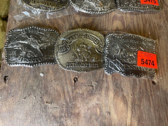 3 Hesston National Finals Rodeo belt buckles