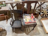 Wood rocking chair and magazines